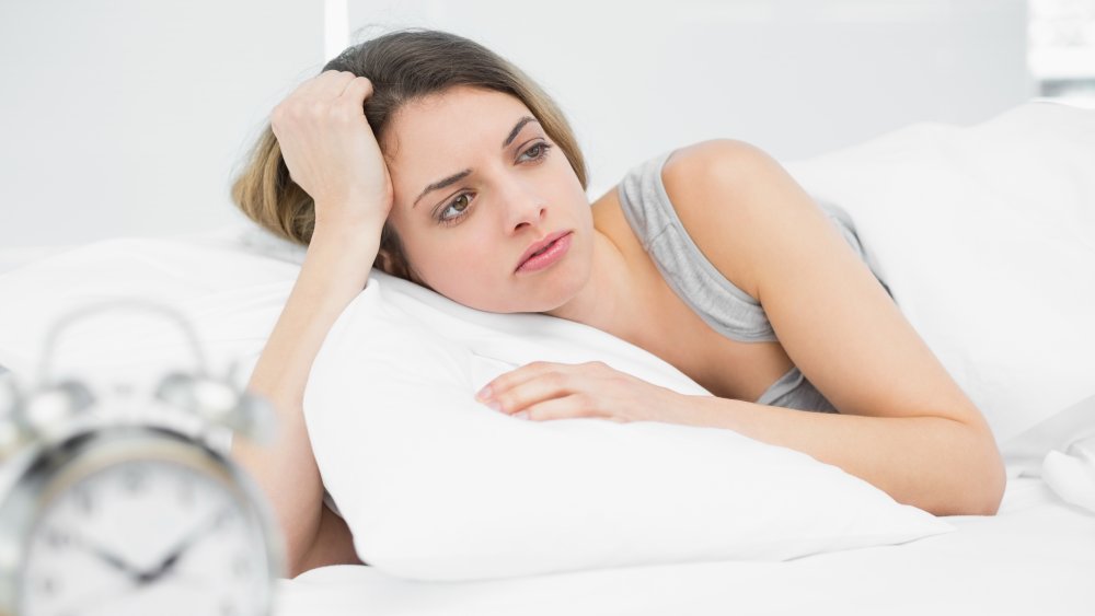 Woman waking up groggy