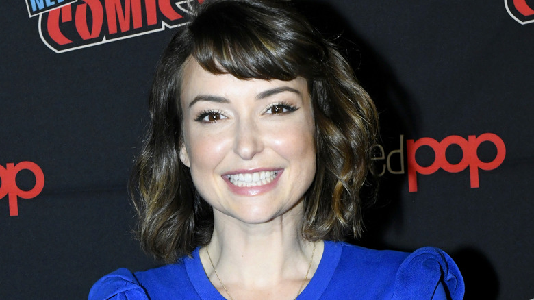 Milana Vayntrub smiling wide 