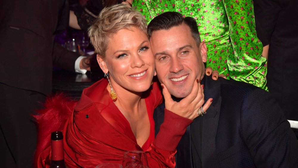 Pink pinching Carey Hart's face at the Grammys