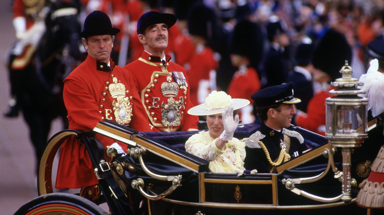 Princess Anne and Mark Phillips in a carriage
