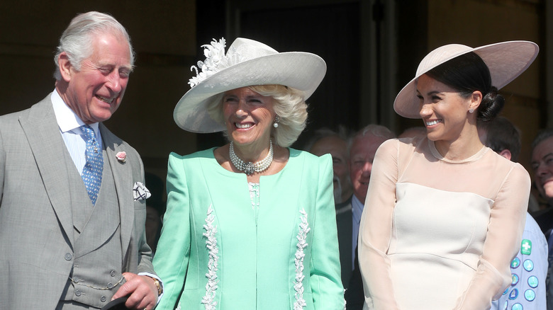 Prince Charles Camilla Parker-Bowles and Meghan Markle