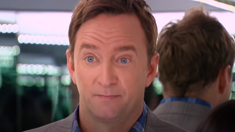 Clinton Kelly standing in the 360 Mirror from "What Not to Wear"