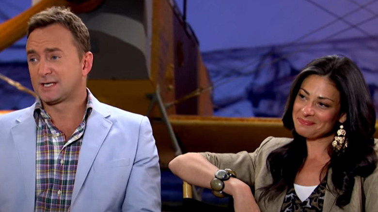 Clinton Kelly sitting left of Stacy London