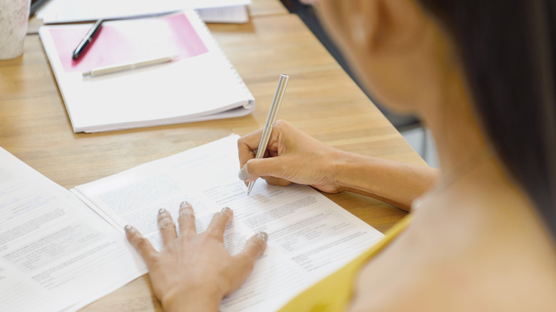 Woman signing contract