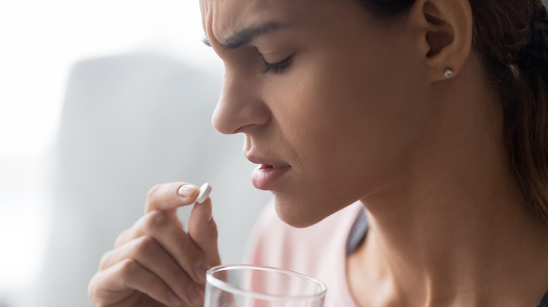 Woman taking antidepressants