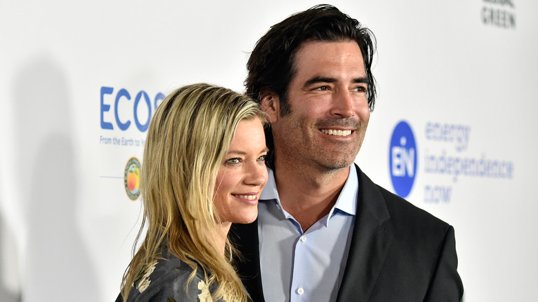 Amy Smart beside husband Carter Oosterhouse