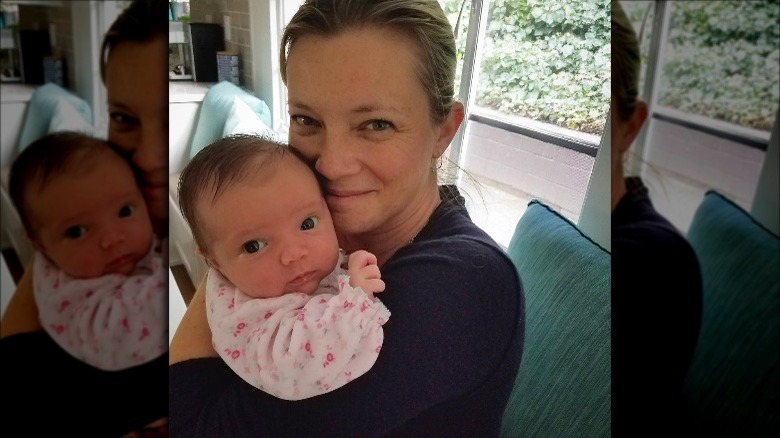 Amy Smart with baby Flora