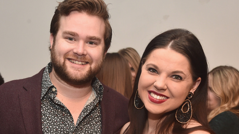 Amy Duggar King and her husband smiling