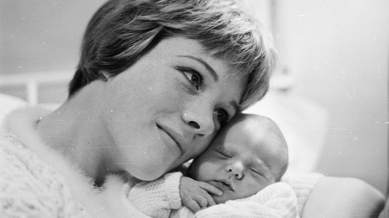 Julie Andrews cuddling her baby daughter