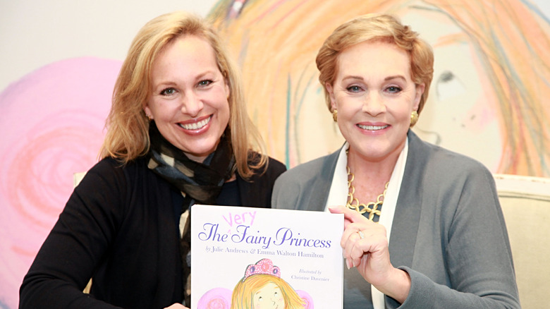 Julie Andrews and Emma Walton Hamilton holding their children's book