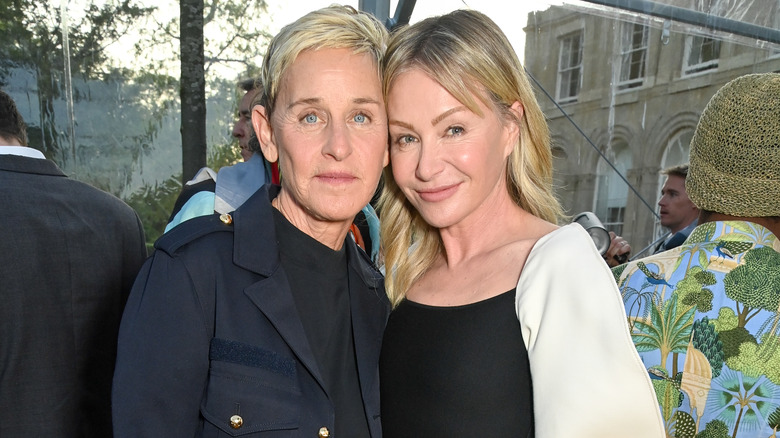 Portia de Rossi and Ellen DeGeneres posing 