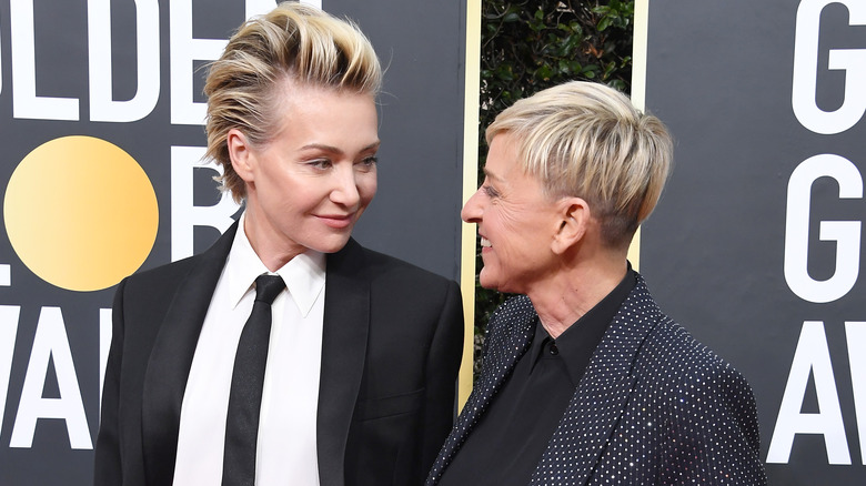 Ellen DeGeneres and Portia de Rossi looking at each other