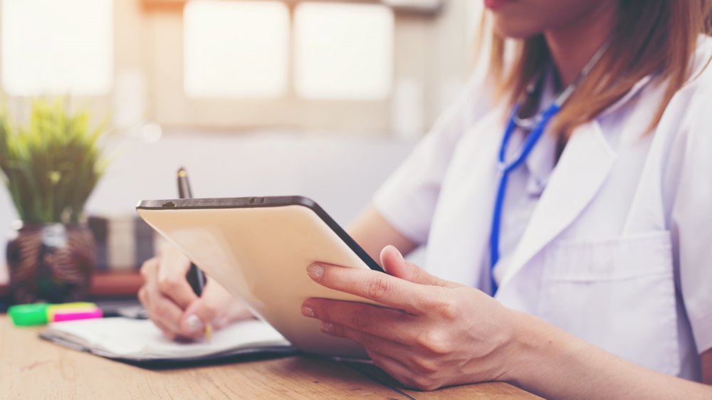 Doctor using a tablet