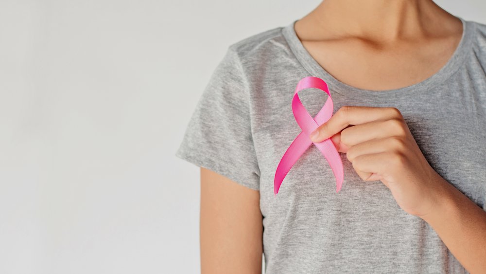 Woman with breast cancer ribbon