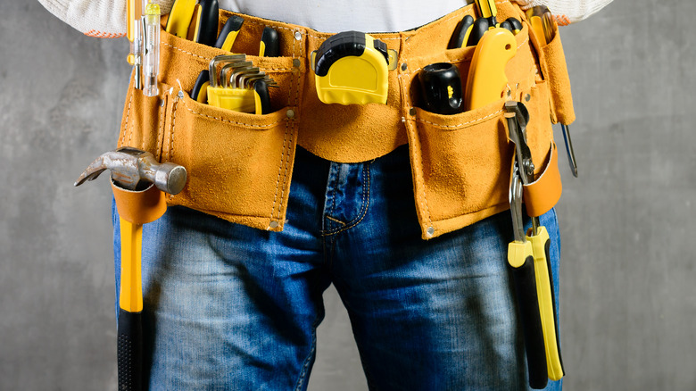 Yellow tool belt with tools