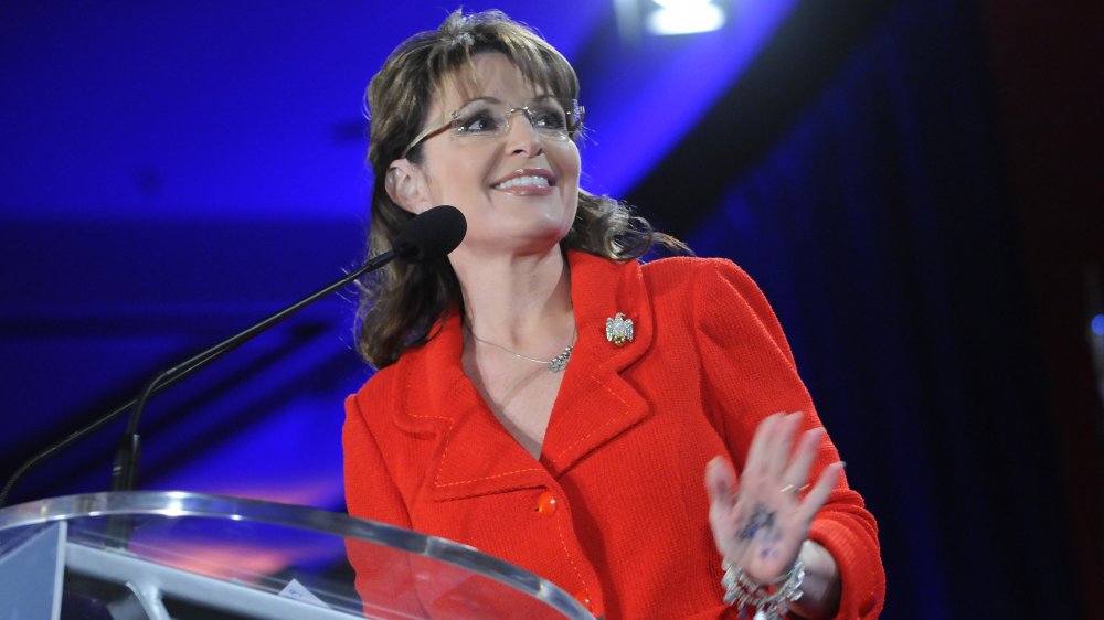 Sarah Palin speaking at a pulpit