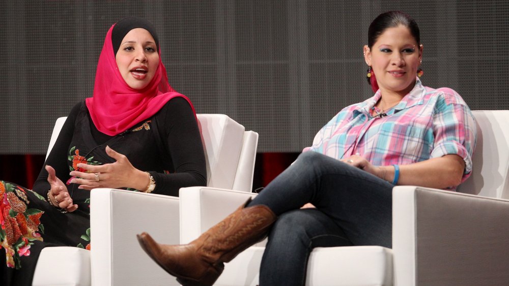 Two cast members of TLC's All American Muslim on a panel