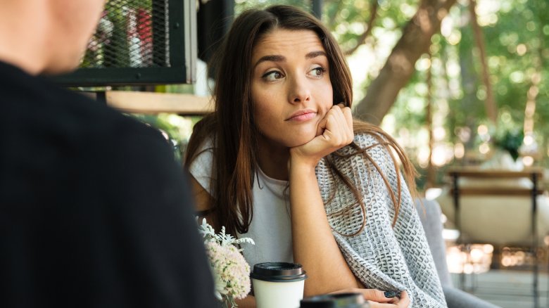 woman at cafe looking away