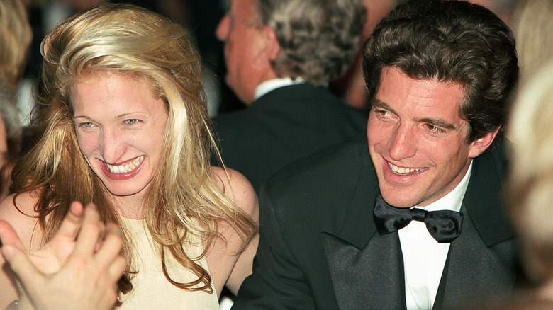 John F. Kennedy Jr. and Carolyn Bessette laughing