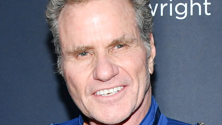 Martin Kove poses at an event