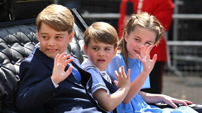 Prince George, Prince Louis, and Princess Charlotte waving