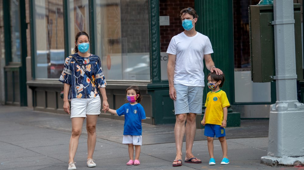Family wearing masks in New York