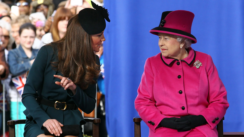 Kate Middleton talking to Queen Elizabeth