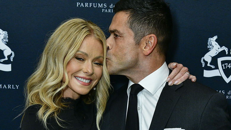 Kelly Ripa and Mark Consuelos hugging