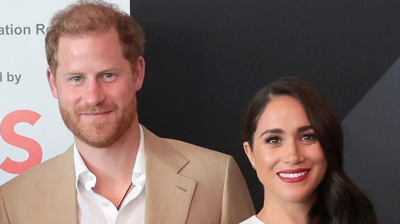 Meghan Markle and Prince Harry posing