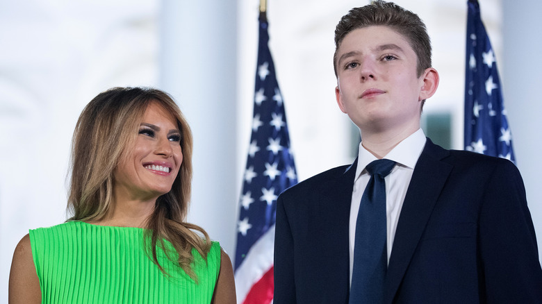 Melania Trump smiling at her son, Barron Trump