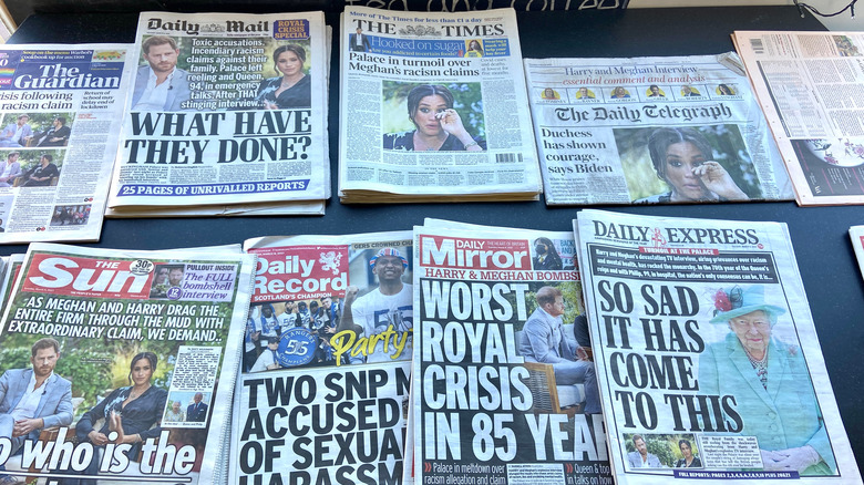 Pictures of the British tabloid newspapers featuring Meghan Markle and Prince Harry