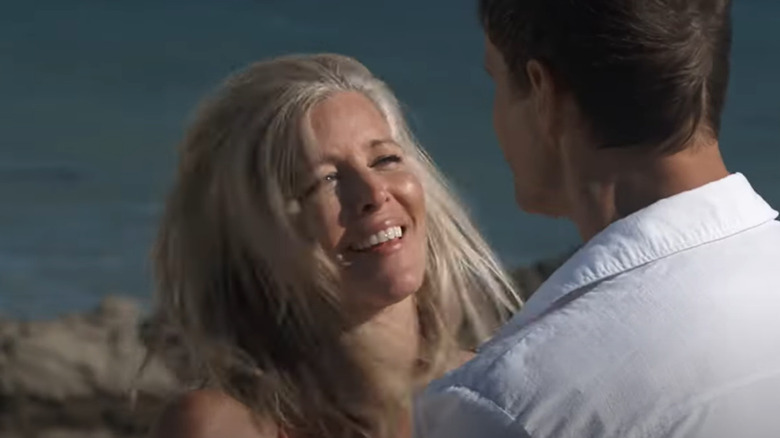 Laura Wright and Cameron Mathison on the beach