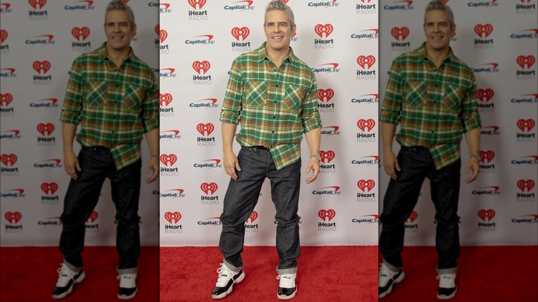 Andy Cohen in plaid, cuffed jeans, sneakers