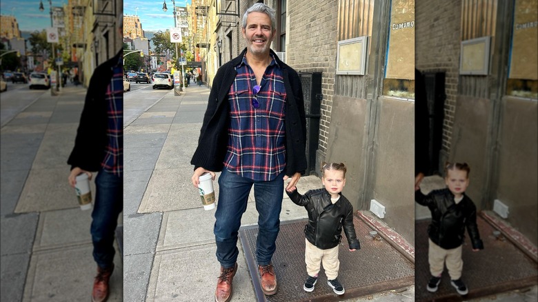 Andy Cohen in blue plaid, jeans, with daughter