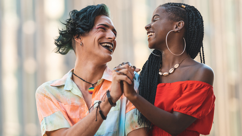 Two people smiling at each other