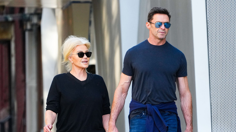 Deborra-Lee Furness and Hugh Jackman hold hands in New York City