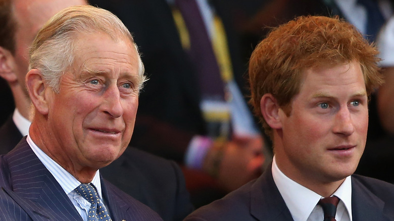 Prince Charles and Prince Harry watching an event