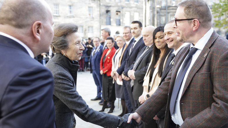 Princess Anne shaking hands