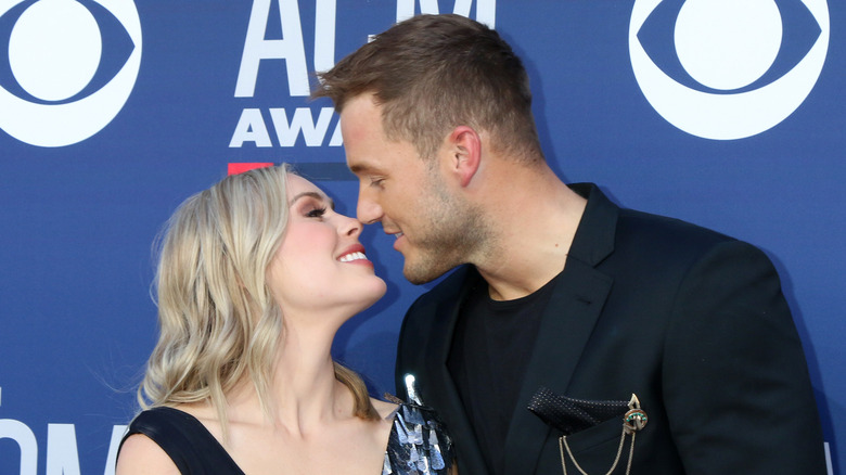 Colton Underwood with Cassie Randolph at event