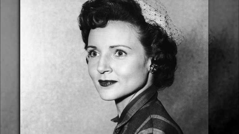 A black and white photo of Betty White