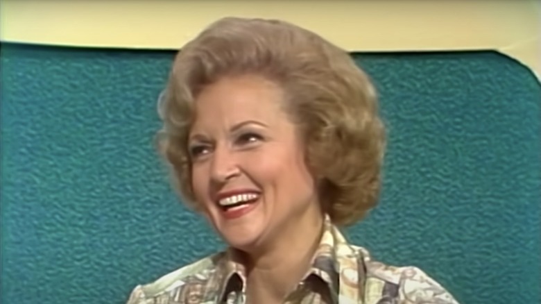 Betty White smiling on a game show