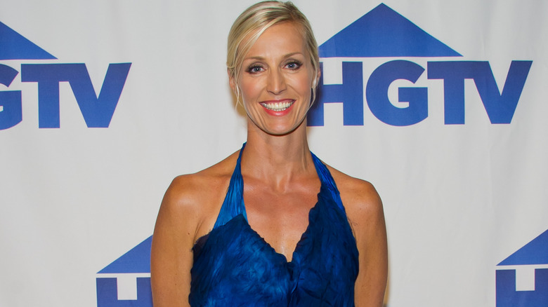 Candice Olson smiling against HGTV backdrop