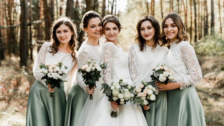 Bride and bridesmaids outdoor portrait