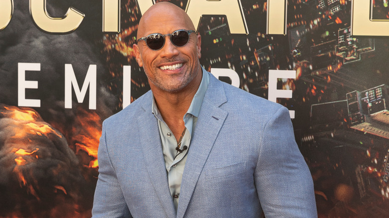 Dwayne Johnson posing at event