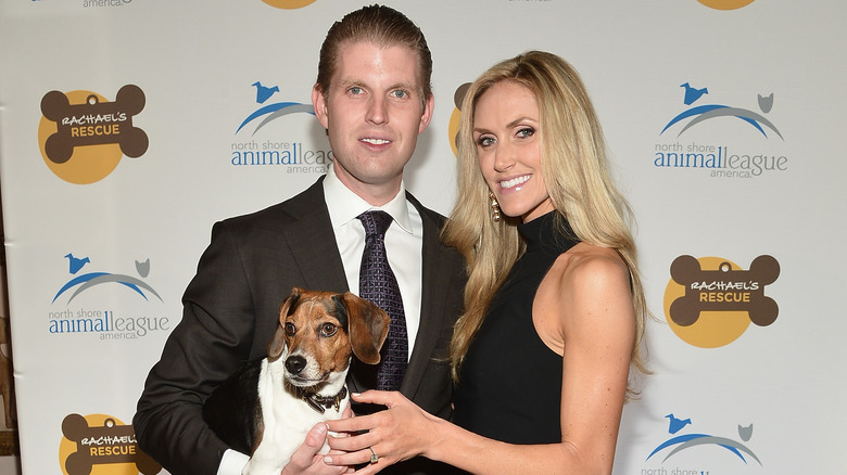 Eric, Charlie, and Lara Trump at an event