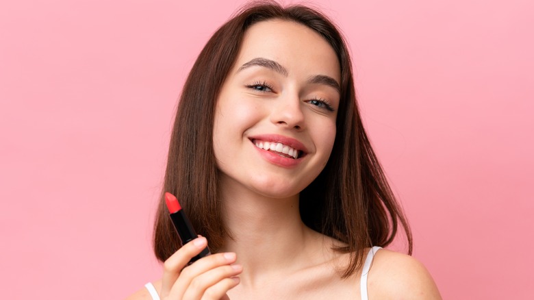 Woman wearing light red lipstick 