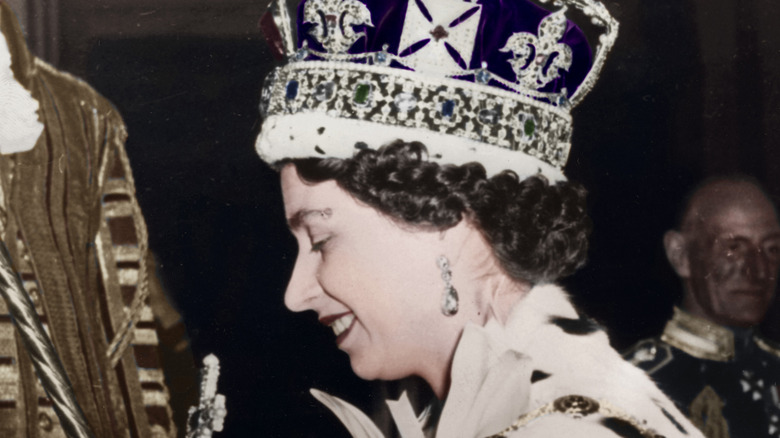 Queen Elizabeth smiling wearing crown at her coronation