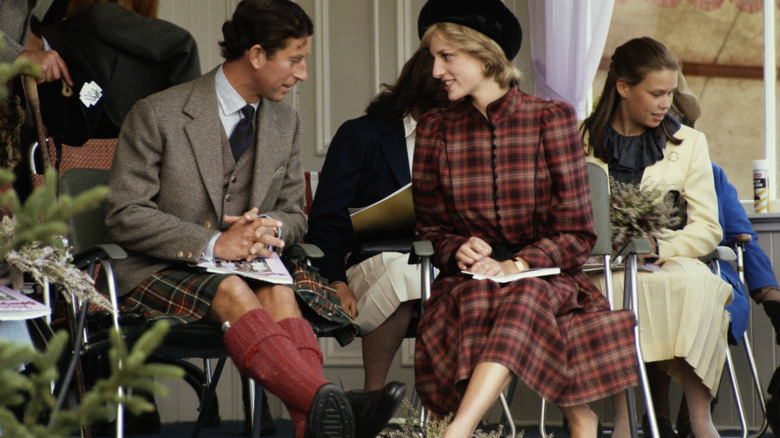 King Charles III and Princess Diana talking 