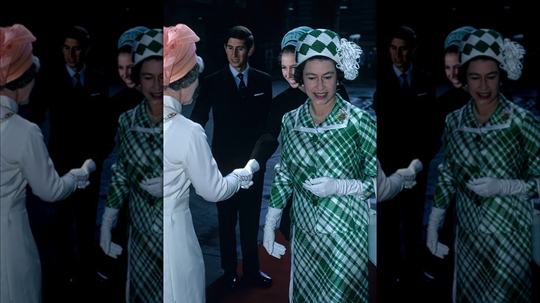 Queen Elizabeth II dressed in green tartan