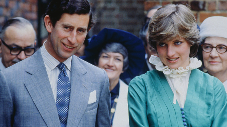 Prince Charles and Princess Diana looking at the camera